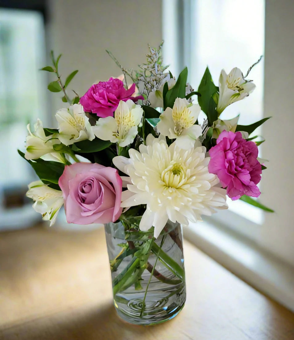 Soft tone flowers delivered in Winnipeg Mb. Send flowers in vase to Winnipeg by best florist in Winnipeg Valley Flowers.