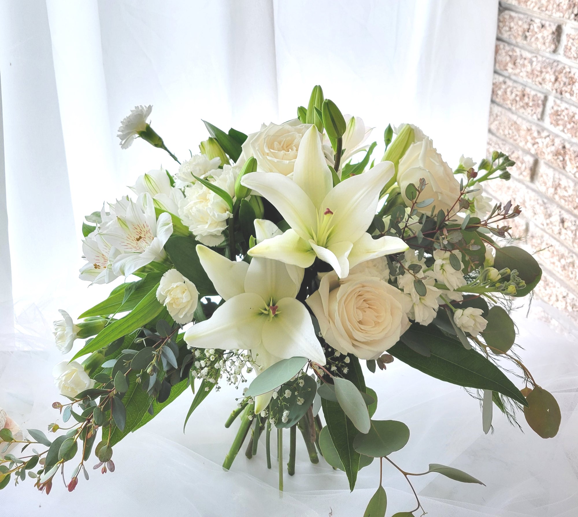 Bridal Bouquet - Loose white garden pave bouquet by Carithers